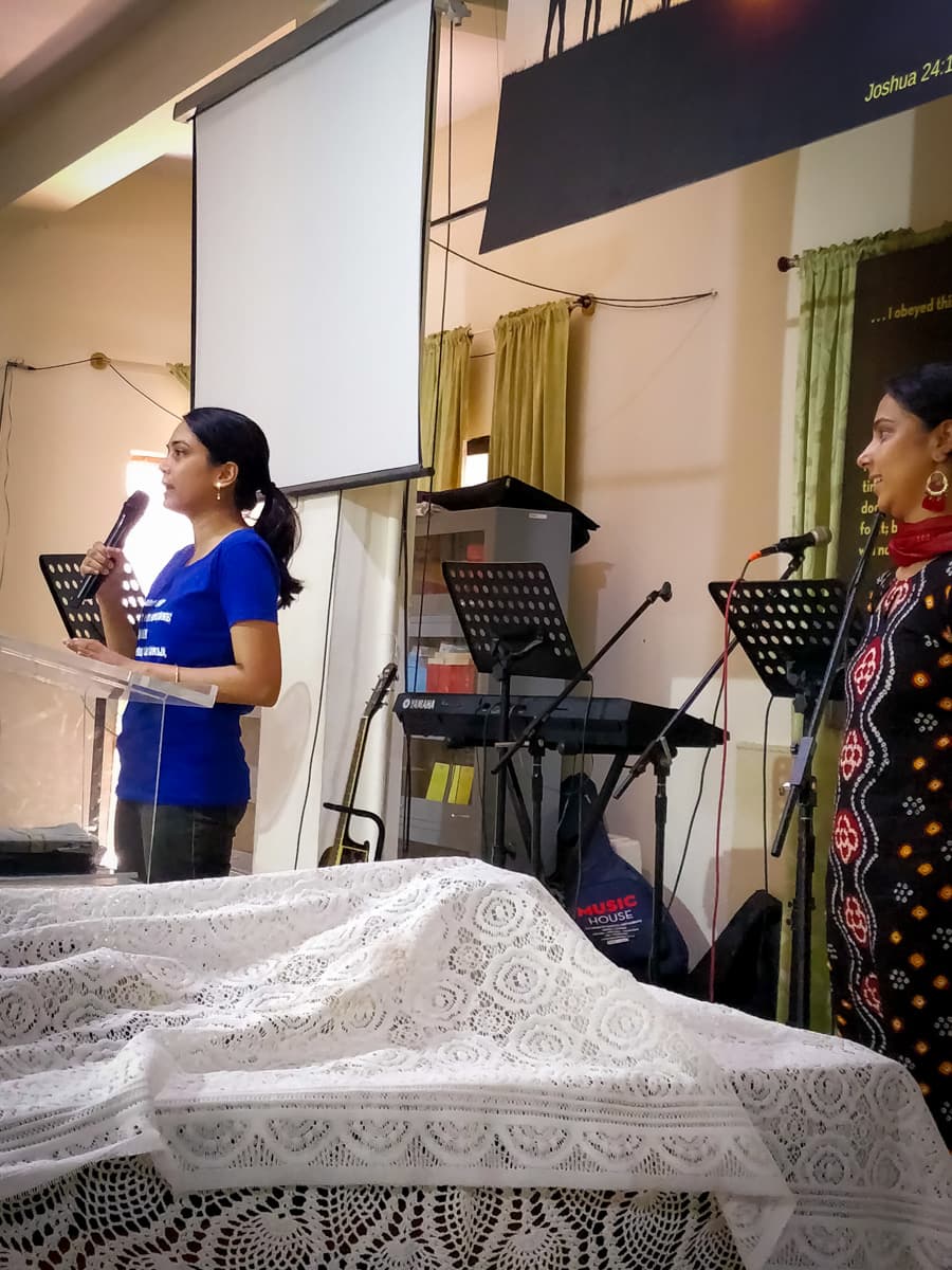 A member of the New Life Fellowship HSR Layout congregation sharing a testimony