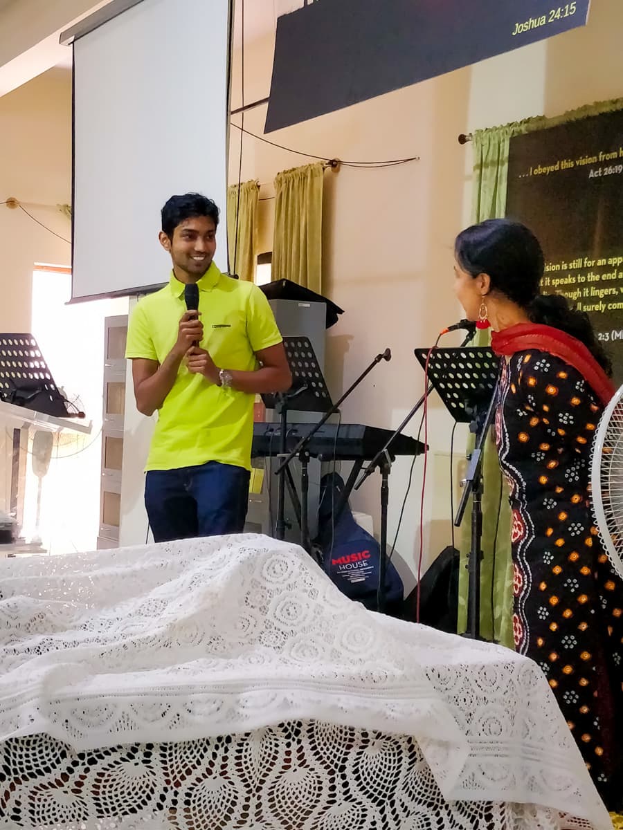A member of the New Life Fellowship HSR Layout congregation sharing a testimony