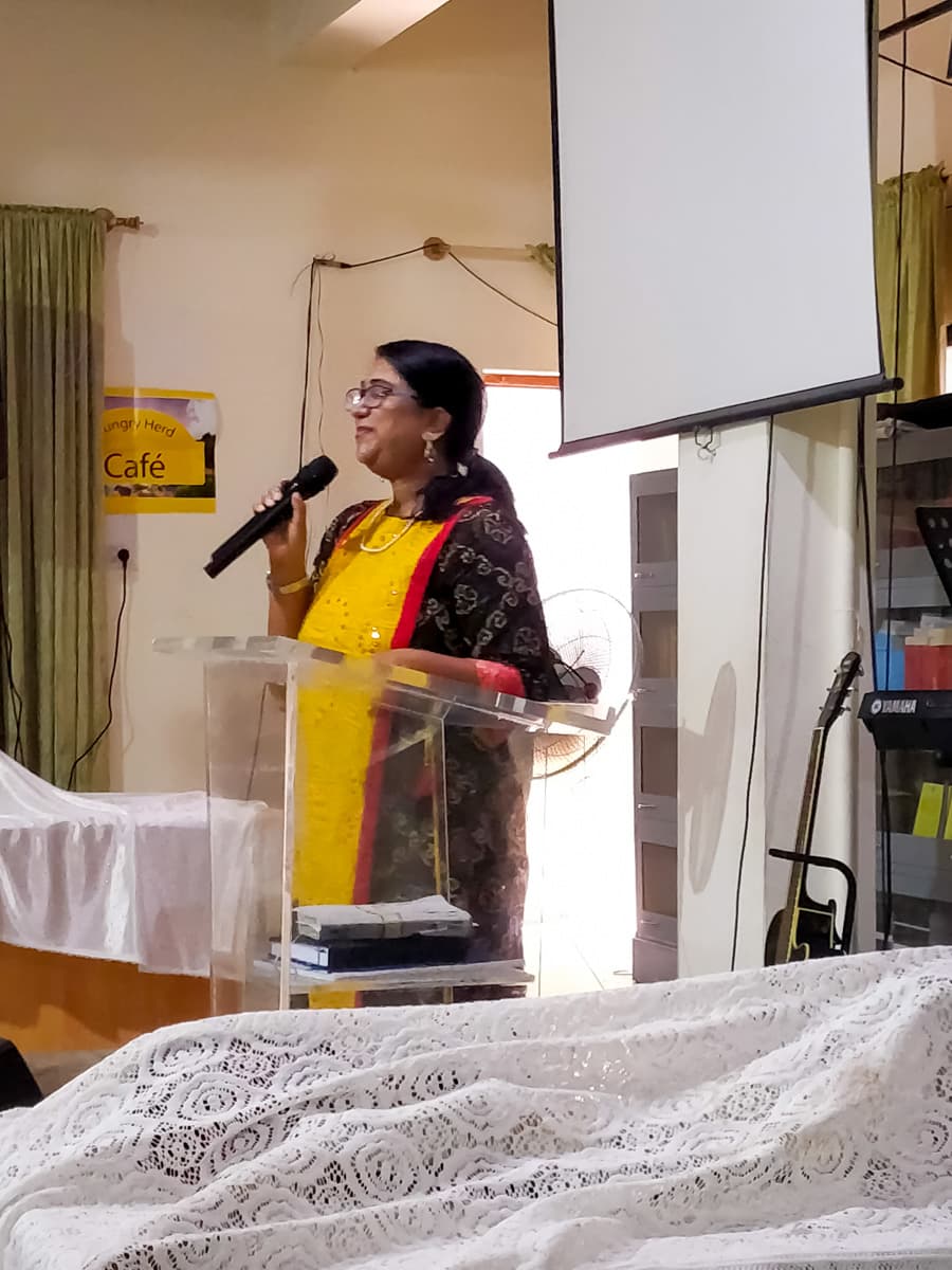 A member of the New Life Fellowship HSR Layout congregation sharing a testimony