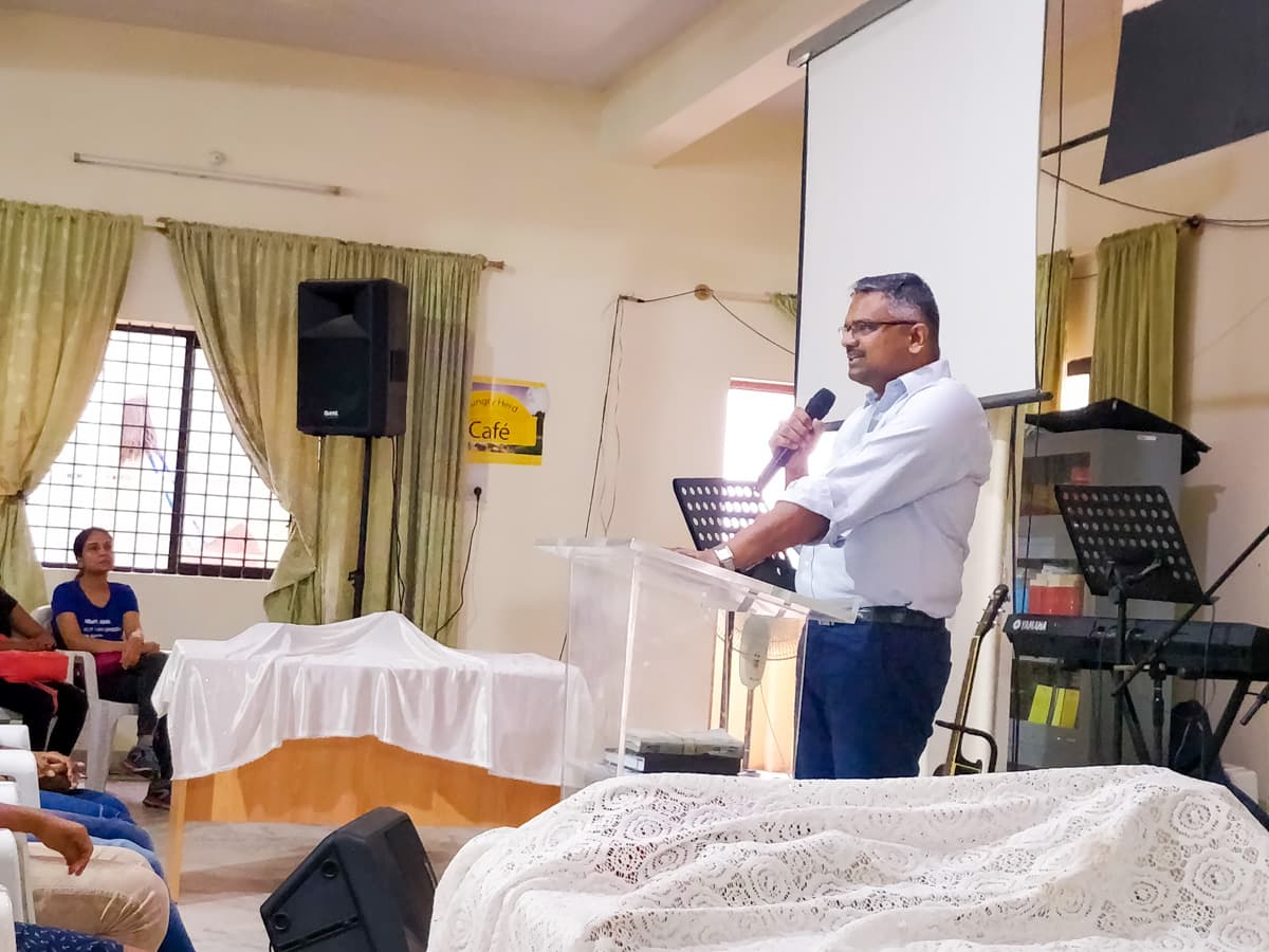A member of the New Life Fellowship HSR Layout congregation sharing a testimony